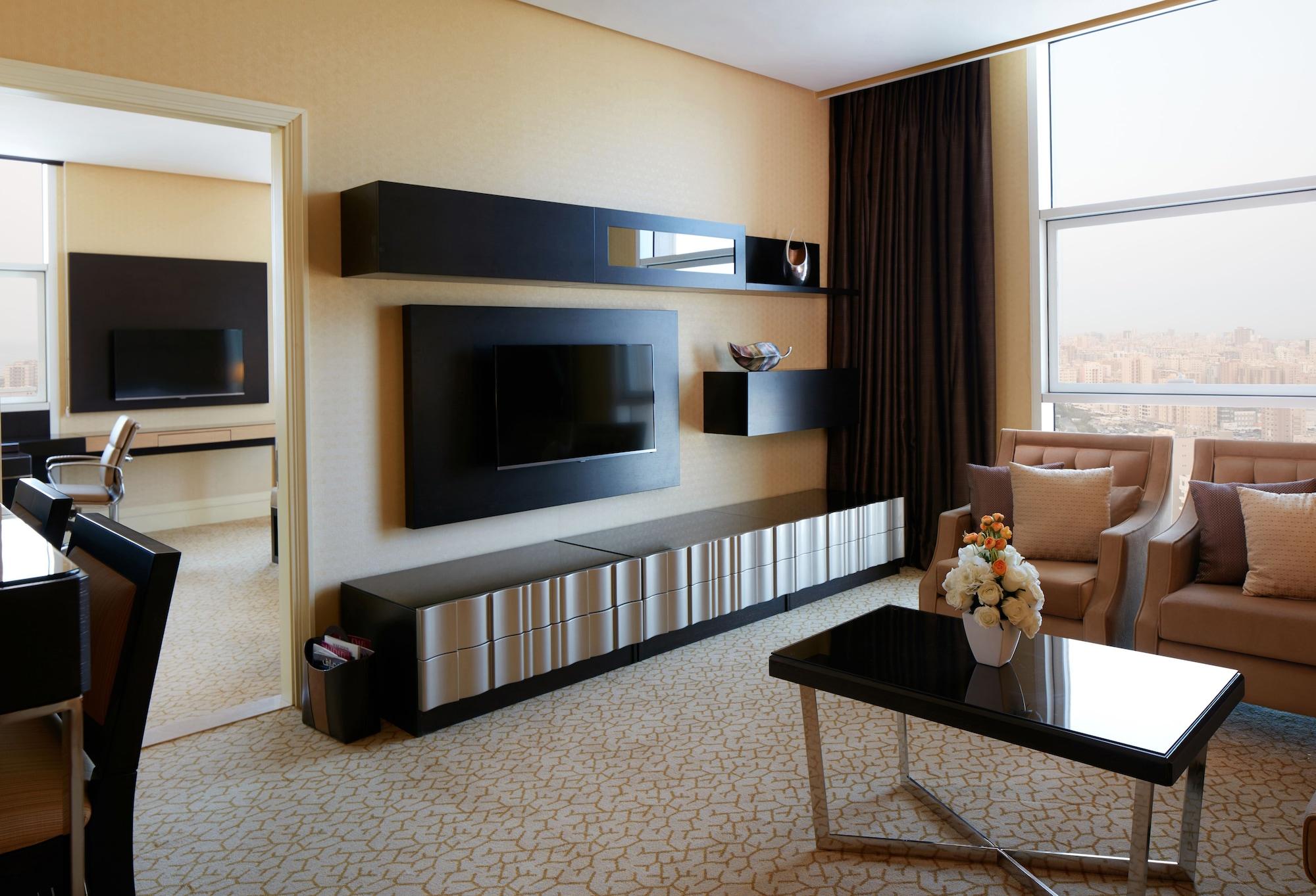 Millennium Hotel & Convention Centre Kuwait Kuwait City Екстер'єр фото A living room with a television