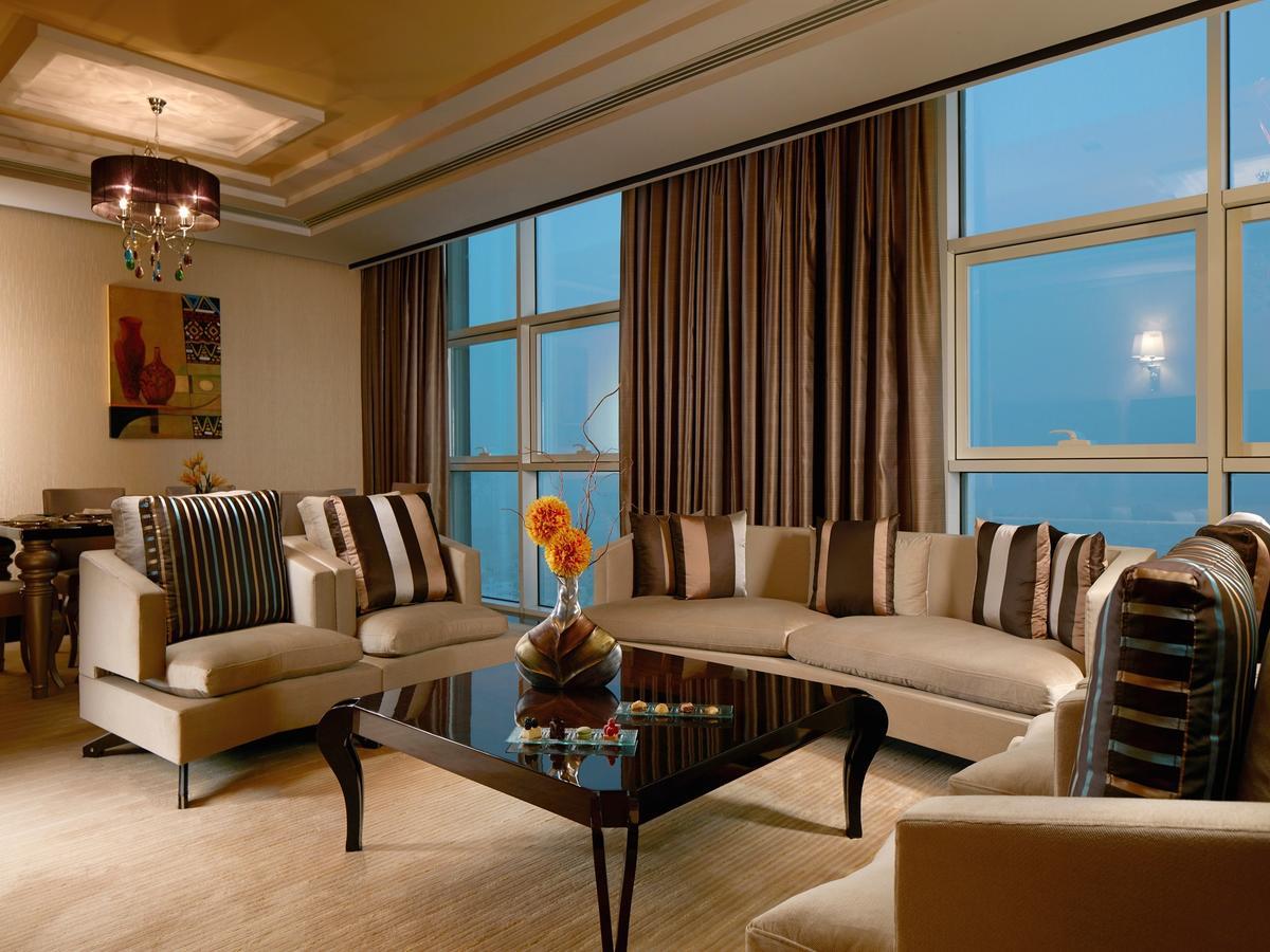 Millennium Hotel & Convention Centre Kuwait Kuwait City Екстер'єр фото A living room in a suite at the Jumeirah Emirates Towers Hotel